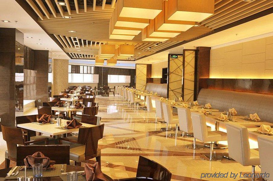 Inzone Garland Hotel Цзінань Ресторан фото